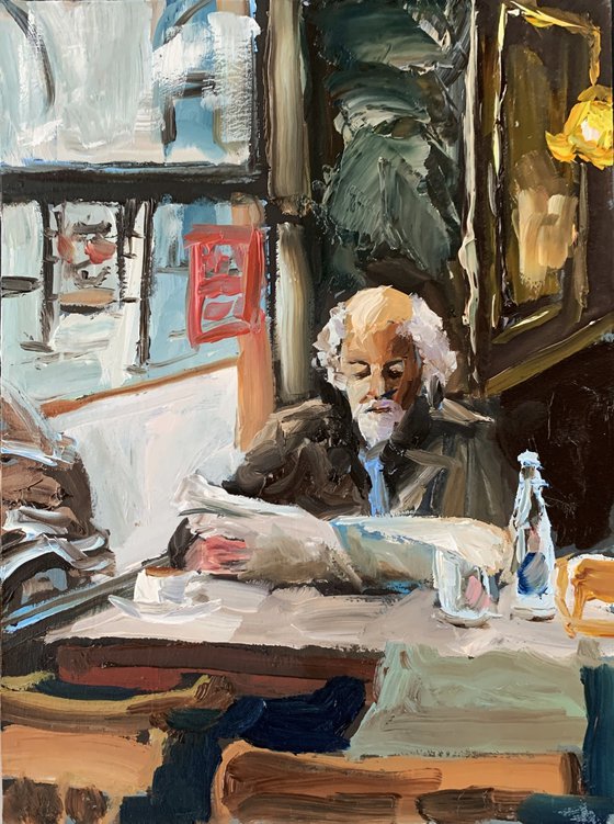 Old man in a cafe.