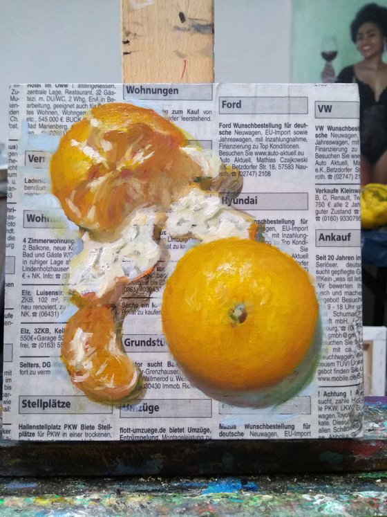 Tangerines on the newspaper