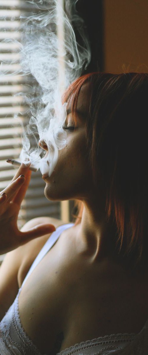 Girl smoking a cigarette by Nikola Lav Ralevic