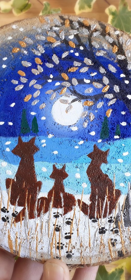 Foxes in the snow by Lisa Mann