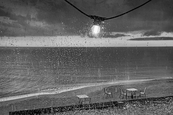 Raining on the coast. B/W