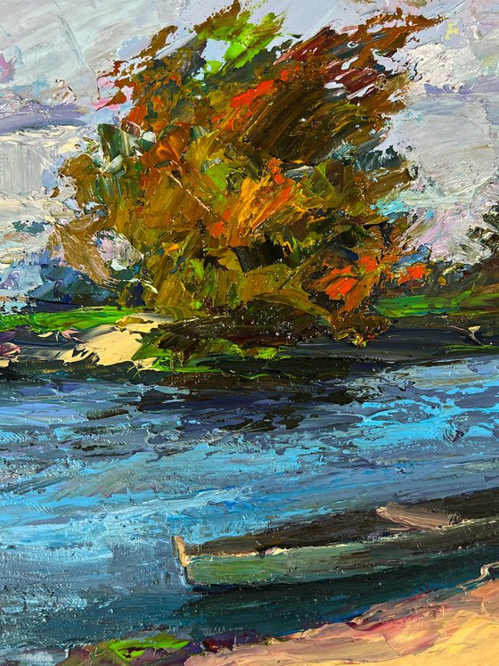 A Boat on the River Bank