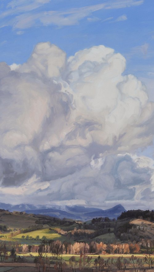 Evening clouds above the Roches de Mariol by ANNE BAUDEQUIN