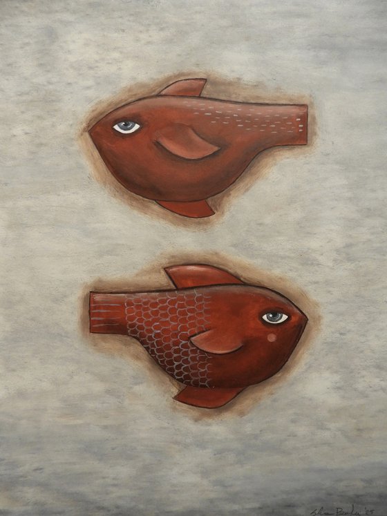 A couple of freaky red fish