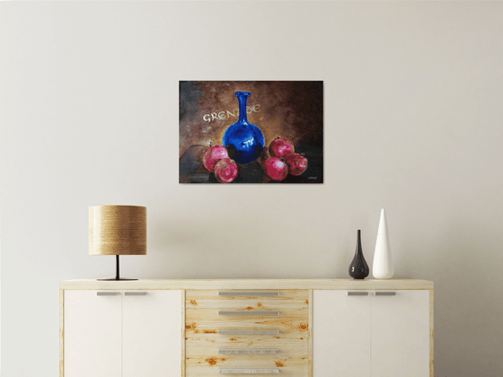 Still life with pomegranates and blue vase