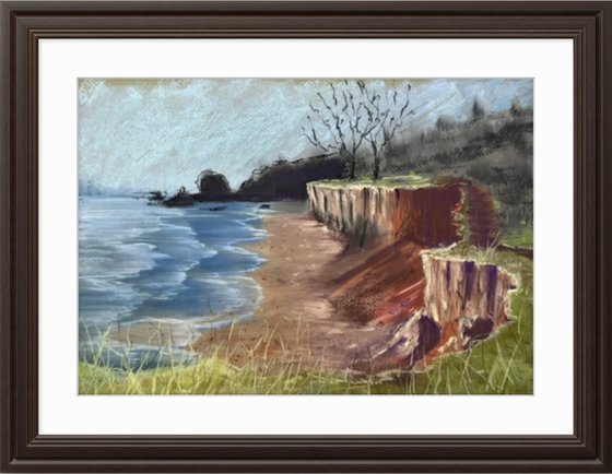 Sunny seashore. Green grass