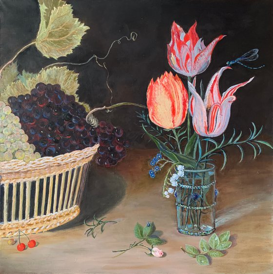 Still life of fruit and flowers with grapes in a wicker basket and tulips in a glass vase