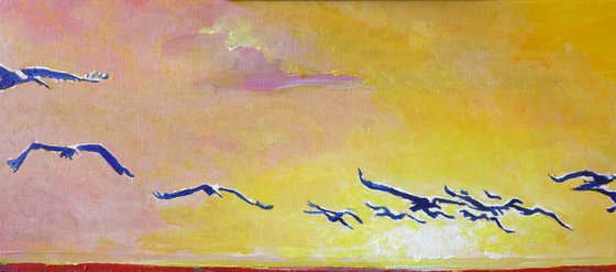 Storks at Sunset