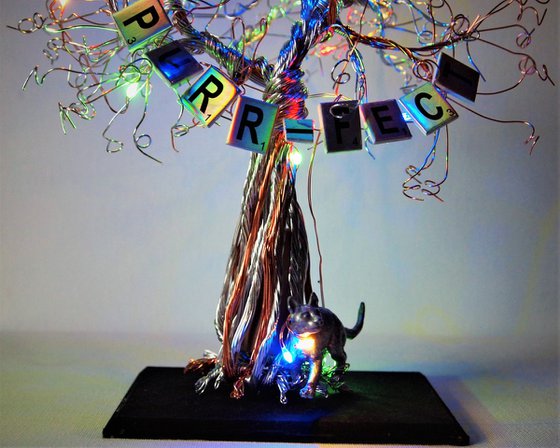 Cat and tree sculpture