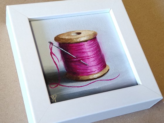 Little pink  cotton reel still life