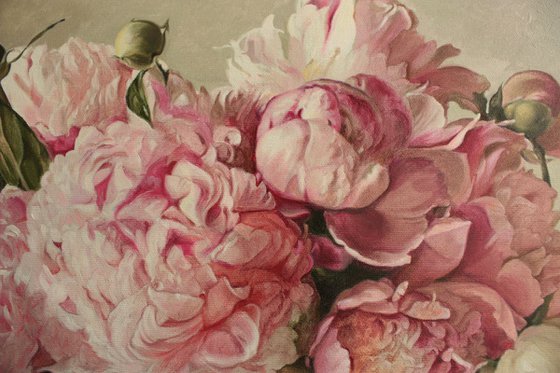 Bouquet of peonies in a white vase