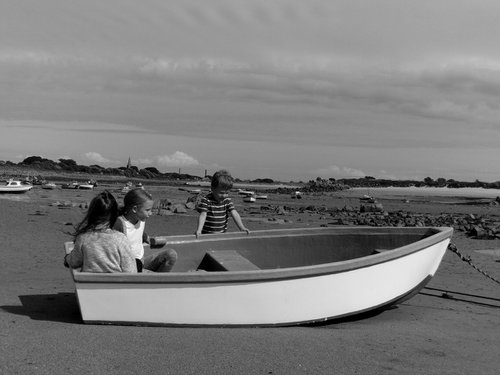 Messing about in a boat at the seaside by Tim Saunders