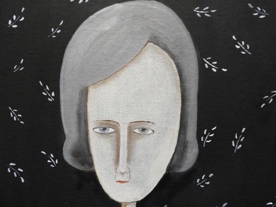 The woman with gray hair