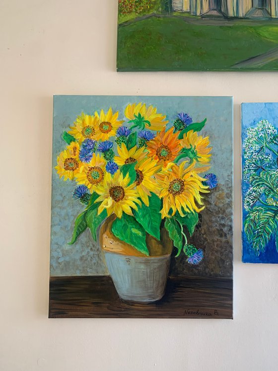 Sunflowers and cardoons