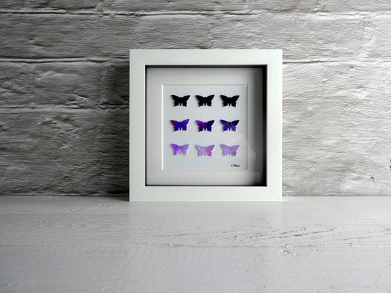 9 Purple butterflies