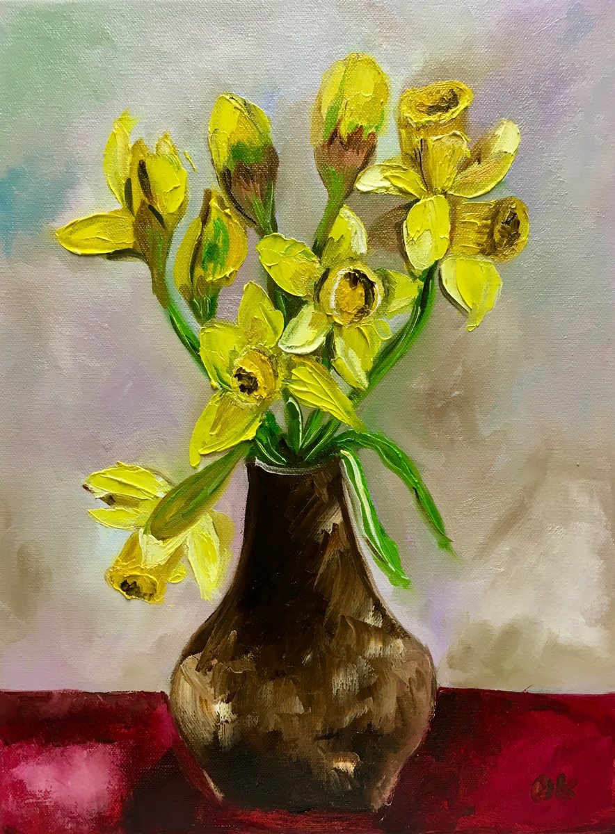 Bouquet of Daffodils on red table, still life inspired by spring. by Olga Koval