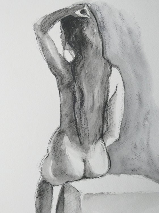 Seated female nude