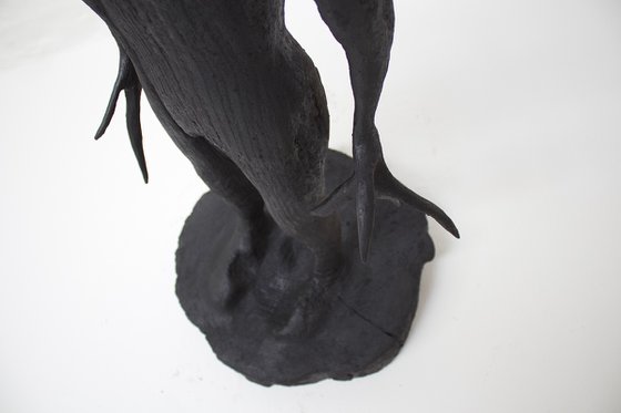 Rooted figure by Tom Heywood