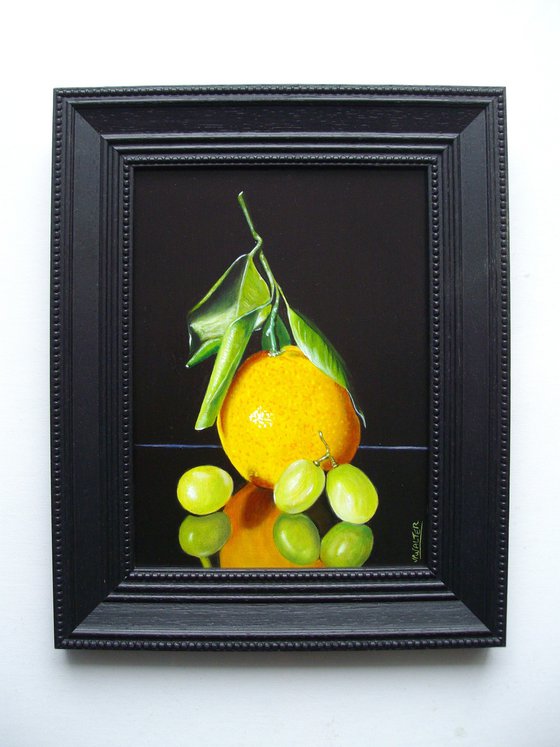 Orange with three grapes