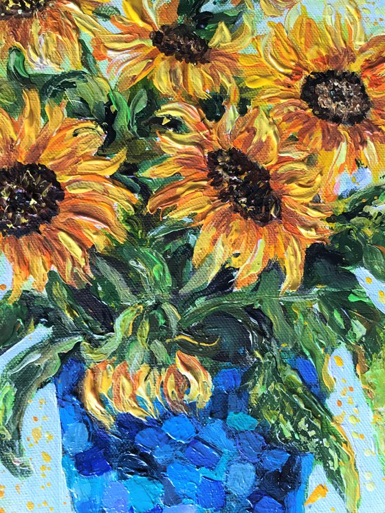 Yellow Sunflowers in a Blue Vase