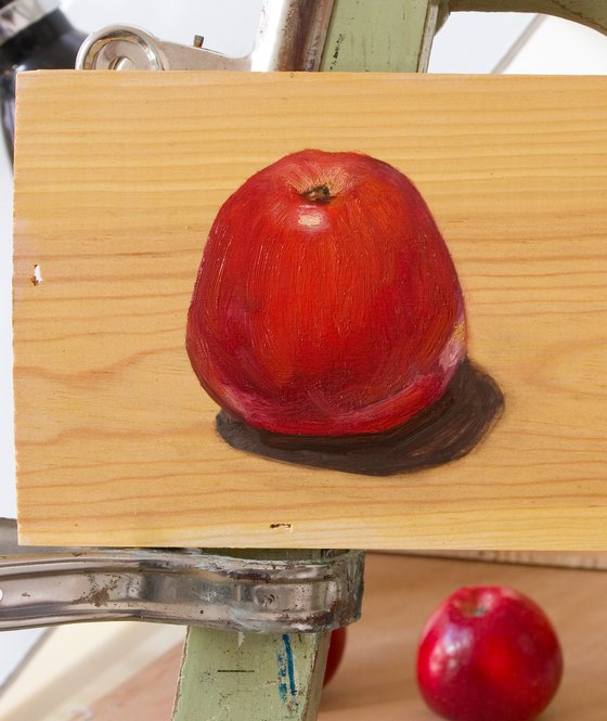 red apple on a wood board for food lovers