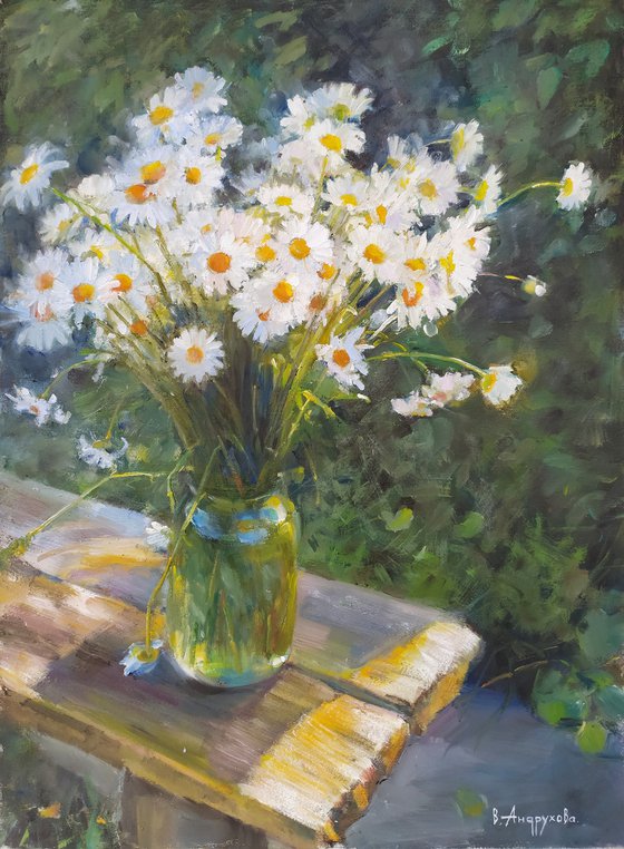 Daisies on a bench