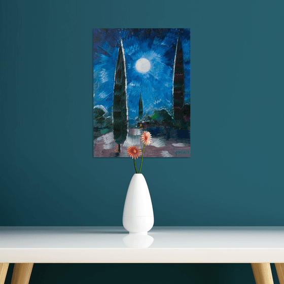 cypresses and a full moon
