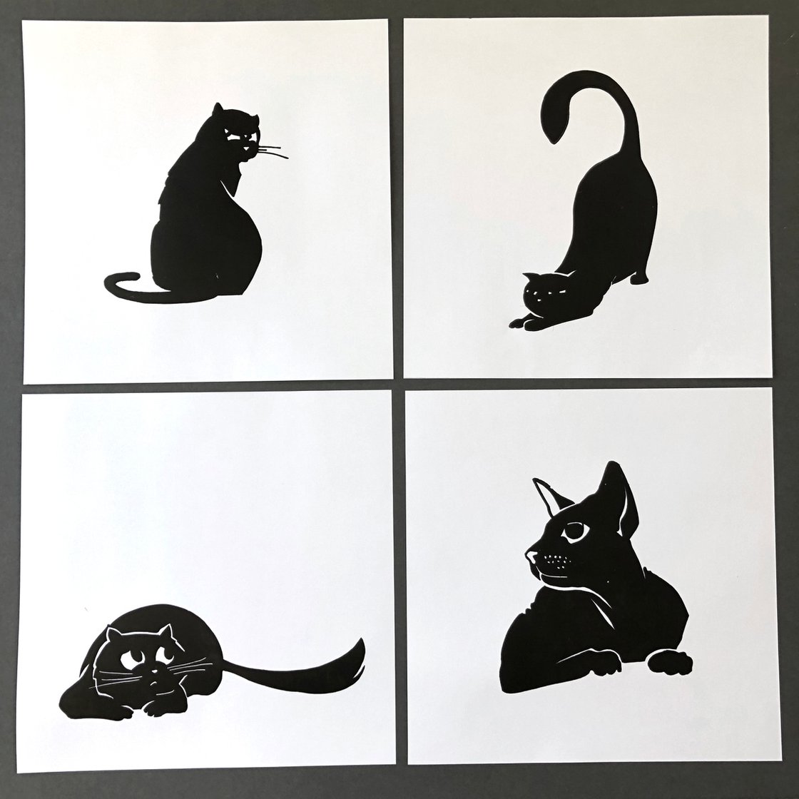 Monochromatic linocut style logo of an angry cat