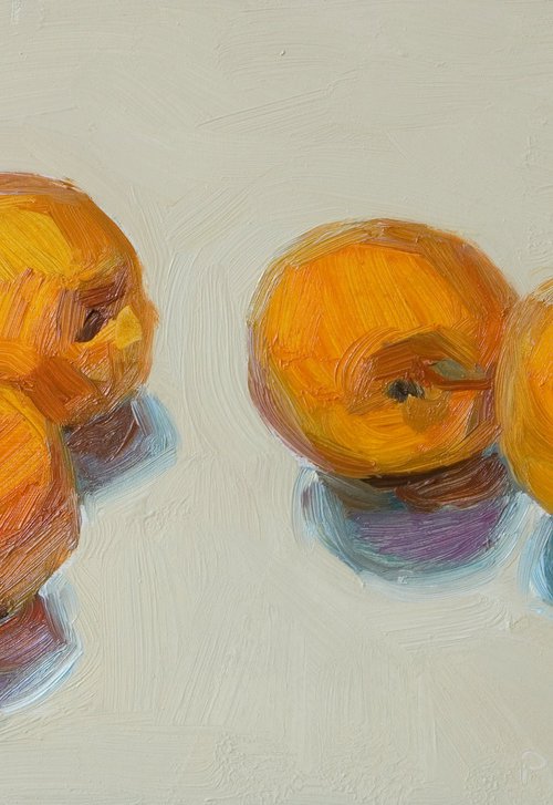 four apricots on white by Olivier Payeur