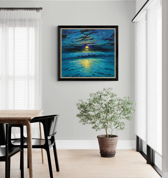 Moonrise in blue over sea