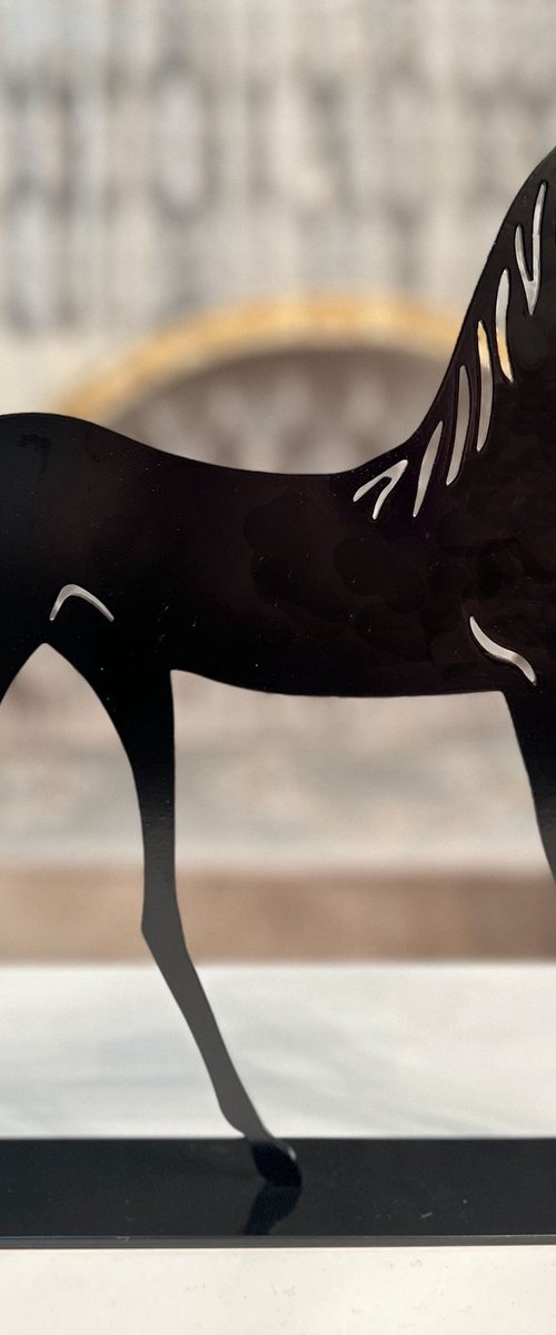 Yasmin metal-cut by Alexandra Shorey