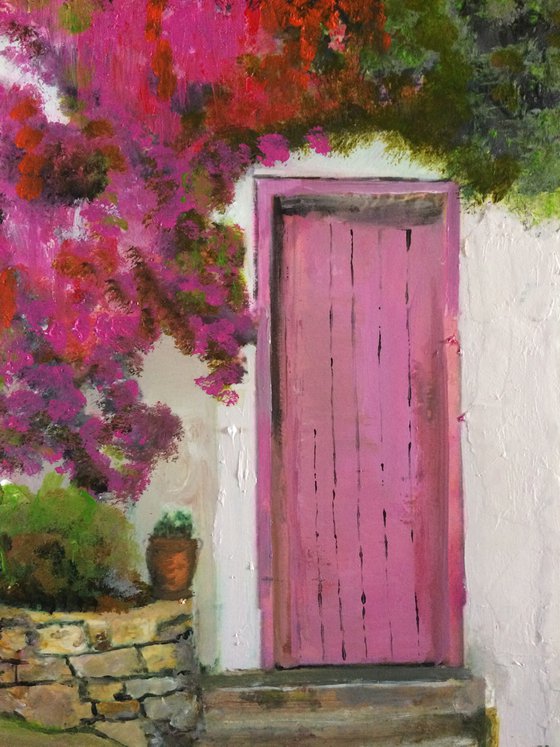 Mediterranean House with Pink Flowers