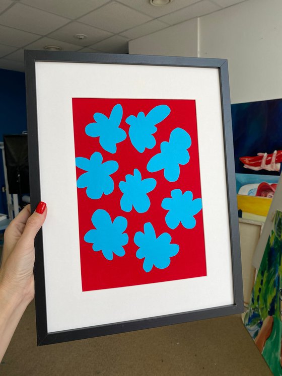 Blue Flower on Red Background