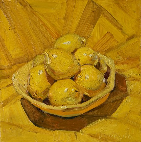 yellow lemons on yellow plate