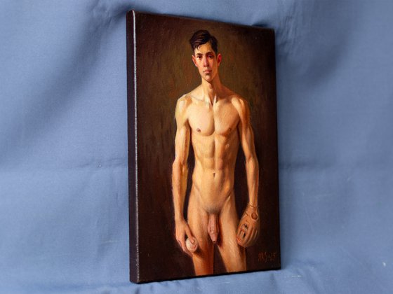 YOUNG MAN WITH A BASEBALL GLOVE