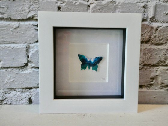 One Emerald Butterfly