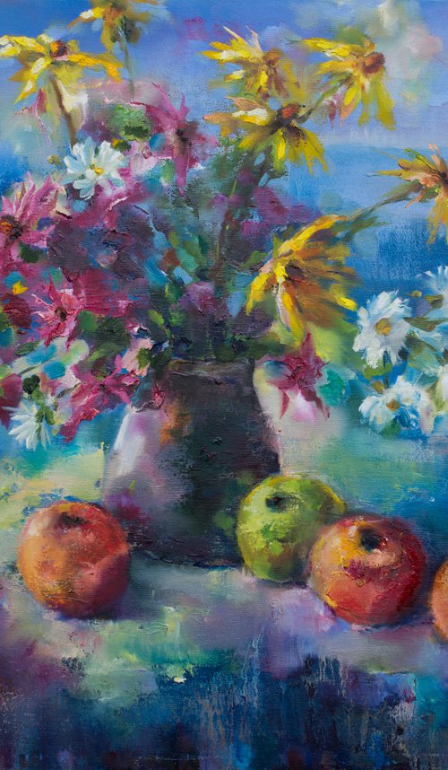 Red apples on blue by Olha Laptieva