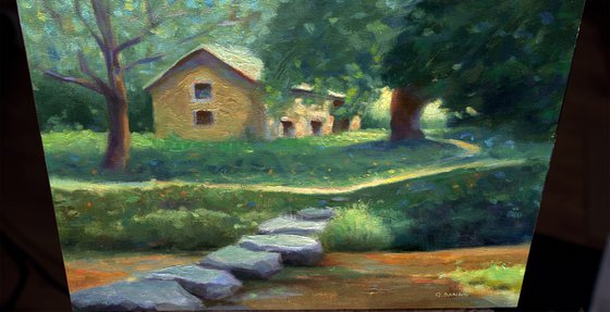 Stepping stones over the river to an Old Barn