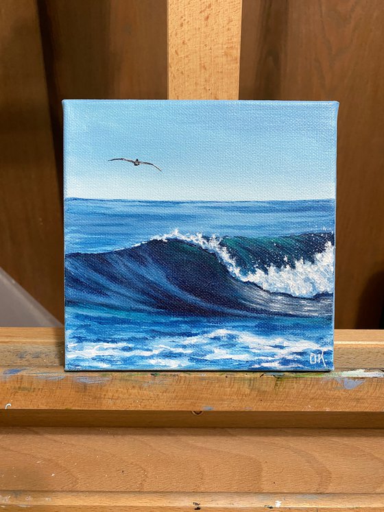 Seagull over the wave