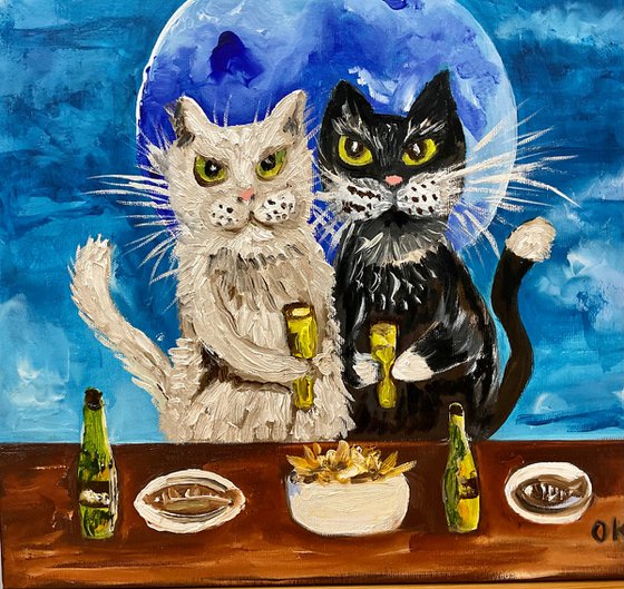 Pint of beer, fish and chips. Lucky couple, two cats friends brings positive emotions in your life.