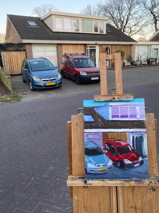 Cars parked near the house