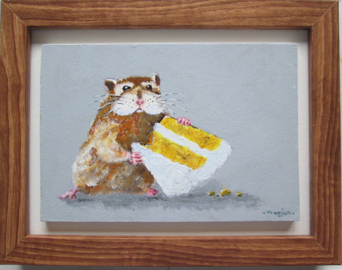 Hamster snacking on a big piece of cake, 