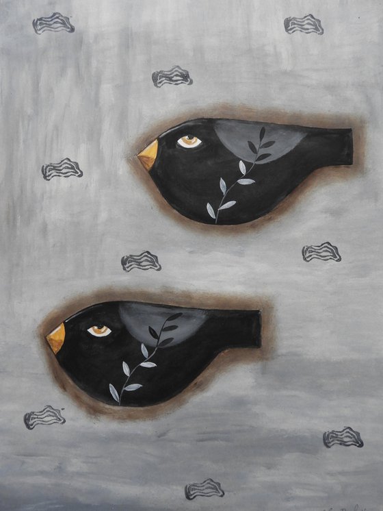 A couple of freaky black birds