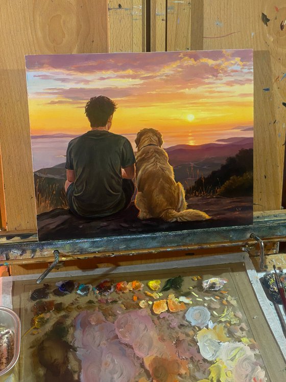 Boy sitting with a Golden Retriever dog