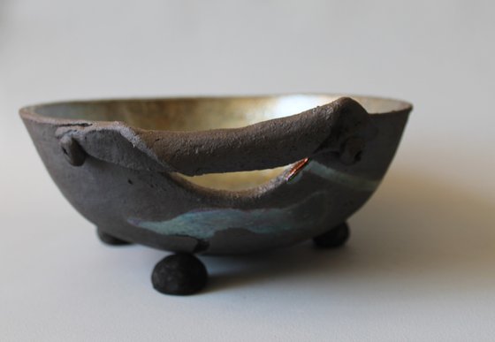 Raku Bowl with handle.