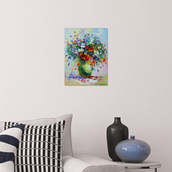A bouquet of meadow flowers in a vase