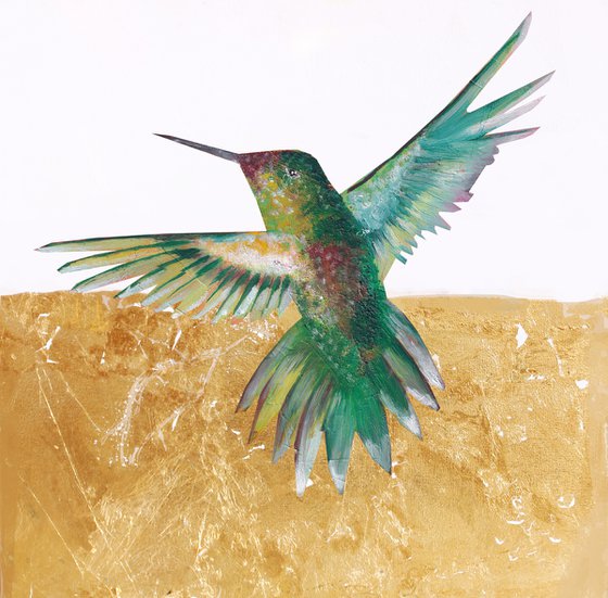 Hummingbird in the golden magical autumn.