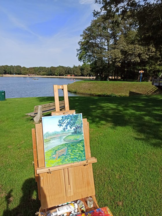 Sunny day at the lake in the park. Pleinair