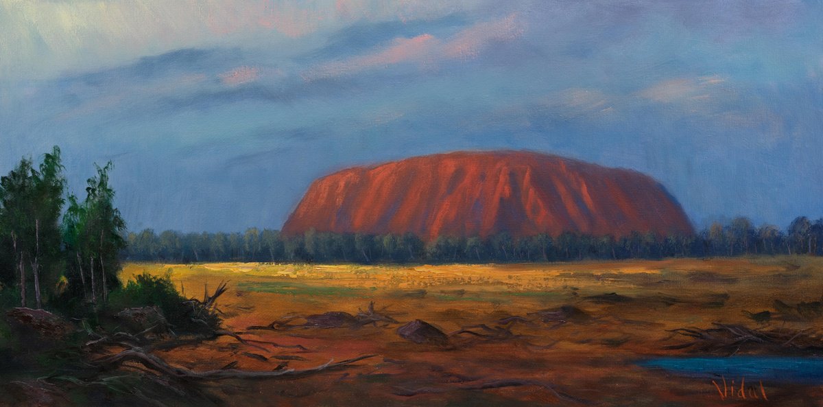 Morning atmospheric light on Uluru (Ayers Rock) by Christopher Vidal