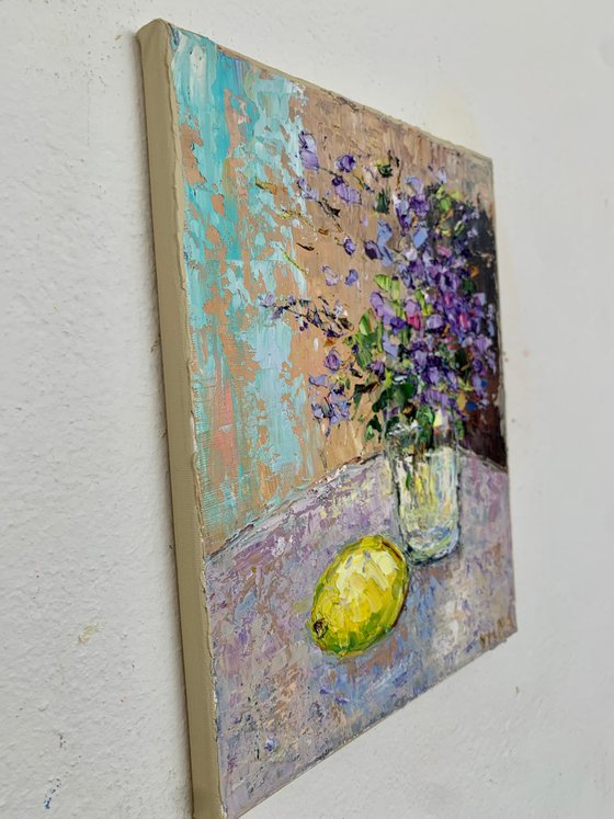 Still life with flowers and lemon